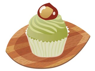 木の皿に乗ったマロンと抹茶のカップケーキ