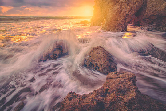 Time lapse photography of sea wave during sunset