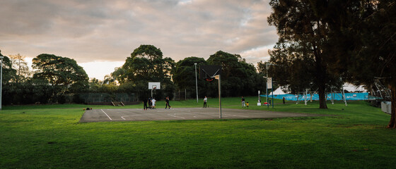 Boys playing basketball