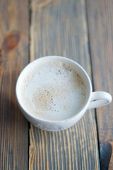 White coffee mug with milk foam