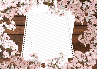 満開の桜の花とノート