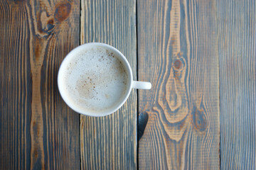 White coffee mug with milk foam