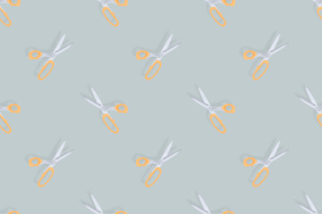 Scissors seamless pattern. Barber scissors against gray background backdrop.