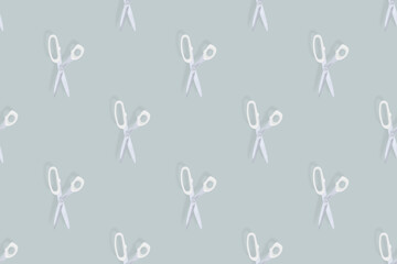 Scissors seamless pattern. Barber scissors against gray background backdrop.