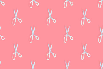 Fototapeta premium Scissors seamless pattern. Barber scissors against red background background.