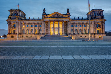 The entrance portal of the famous Reichstag in Berlin at dawn