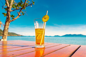 lemon tea glass placed by the sea	
