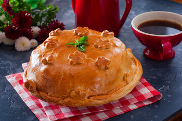 Festive traditional Russian pie kurnik with pancakes, mushrooms, chicken, horizontal © Анна Журавлева