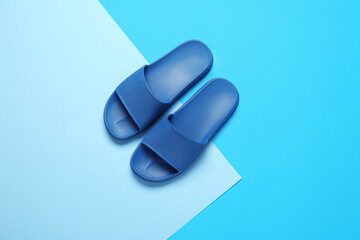 Male flip-flops on color background