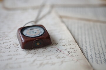 Old vintage manuscript with vintage altimeter