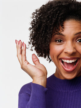 Young woman smiling excitedly