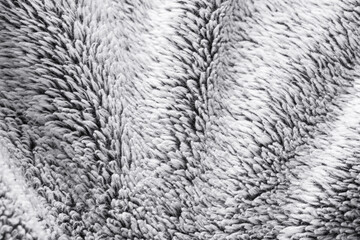 Grey fur textile textured background