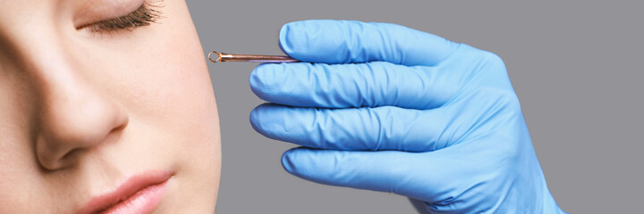 Loop device for medical design. Woman skin procedure. Cosmetic products.Hands in gloves. Beauty face. Facial cosmetology treatment. Healthcare anti acne. Apply to female. Detox therapy. Rejuvenation