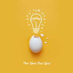 Egg with a light bulb and an inscription: new year, new you. A symbol of changing personality and creativity in the new year