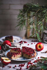 Hot spiced apple, cranberry and ginger upside down cake...selective focus