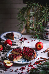 Fototapeta na wymiar Hot spiced apple, cranberry and ginger upside down cake...selective focus