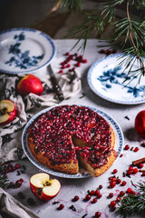 Hot spiced apple, cranberry and ginger upside down cake...selective focus