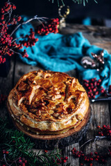 meat pie with different types of meat. Rustic style