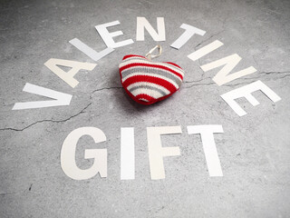 valentine gift box on green background, closeup