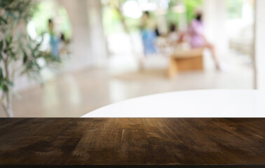 Wood Table Top in Blur Background room interior with empty copy space.