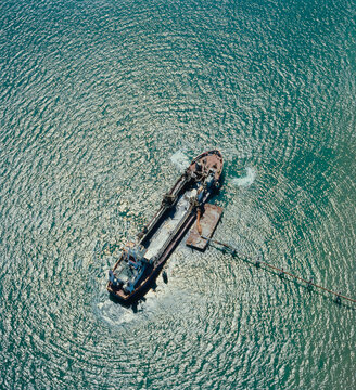 Aerial of Sand Dredge working at sea