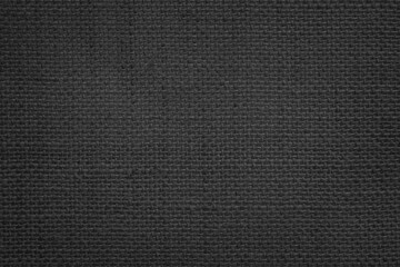 Jute hessian sackcloth canvas woven texture pattern background in light black color blank empty.
