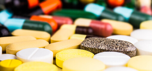 Drug prescription for treatment medication. Pharmaceutical medicament, cure in container for health. Pharmacy theme, capsule pills with medicine antibiotic in packages.closeup,Medicine or capsules.