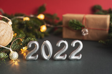 New Year 2021 silver balloons with fireworks. Blurred lights in the background