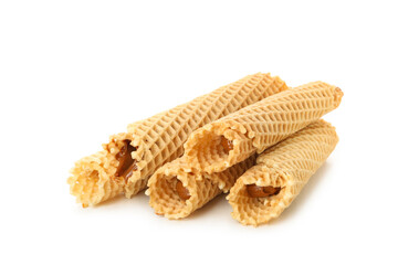 Wafer rolls with condensed milk isolated on white background