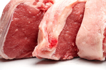 Fresh lamb loin chops on a white isolated background. Meat industry product.