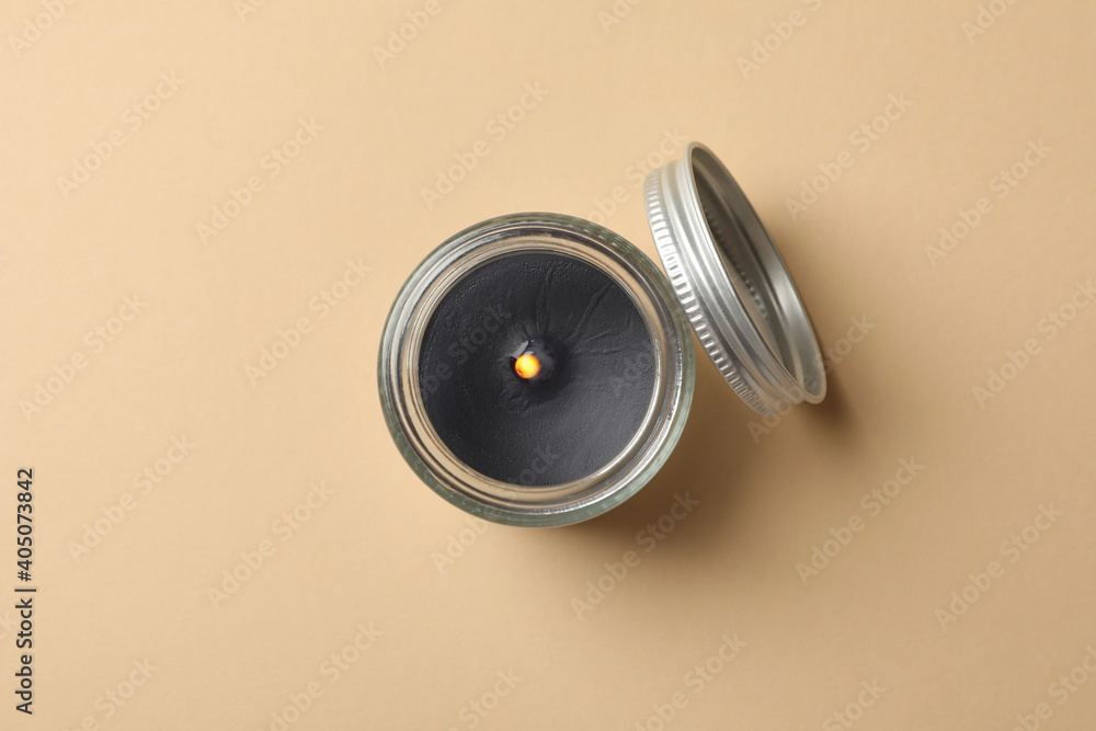 Wall mural Scented candle for relax on beige background