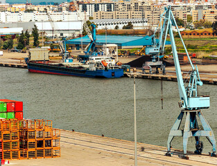 Port of Seville on the Guadalquivir river in Spain
