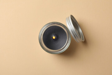 Scented candle for relax on beige background