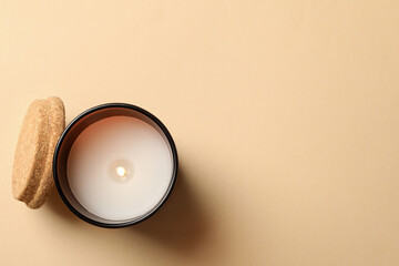 Scented candle for relax on beige background