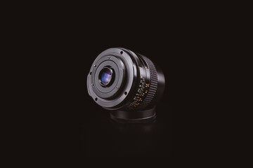 Old M42 mount vintage lens.
Good quality, versatile and easy to adapt almost any of these modern days mirrorless camera systems with a single adapter.