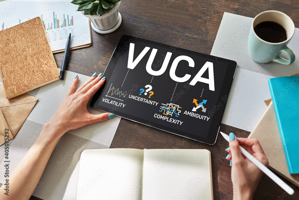 Poster vuca world concept on screen. volatility, uncertainty, complexity, ambiguity.