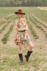 Cowboy girl in the field