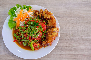spicy salad with long bean and crispy pork