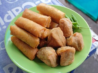 Tofu Meatballs and Croquettes, a hot snack served with chilies to add to your appetite