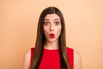 Photo of astonished young woman crazy unexpected sale shopping isolated on pastel beige color background