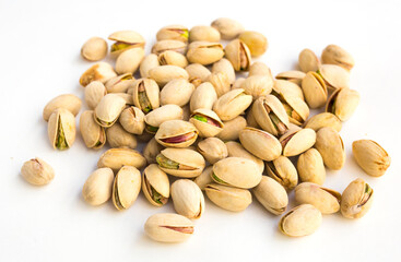 roasted pistachios on white background