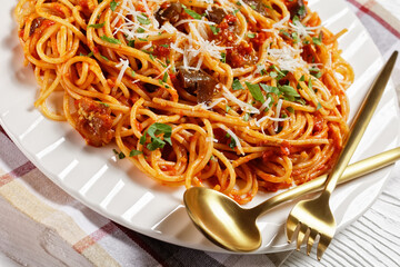 pasta alla norma on a white plate