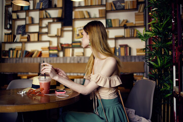 pretty woman in restaurant rest glass with drink lifestyle