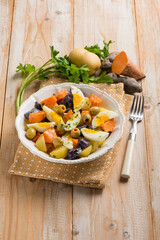 mixed salad with egg purple potatoes and olives