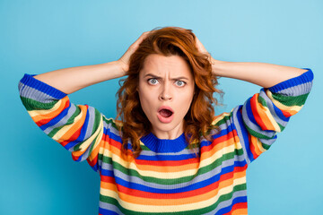 Fototapeta premium Photo of attractive wavy hairdo person arms behind head open mouth staring sweater isolated on blue color background