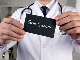 Skin Cancer  phrase on the piece of paper.