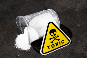 white chemical powder with toxic mark