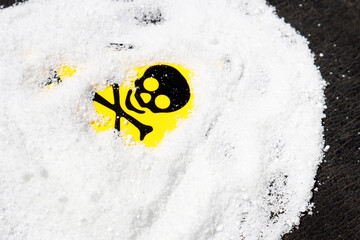 white chemical powder with toxic mark