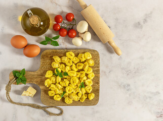 Homemade raw Italian stuffed pasta tortellini