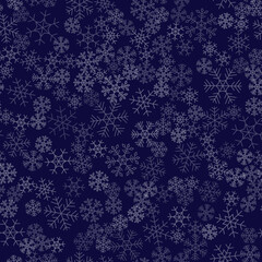 Fototapeta na wymiar Seamless winter background consisting of snowflakes of different shapes